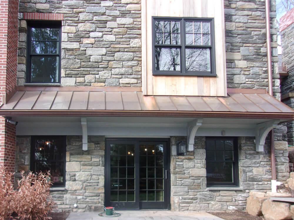 Copper standing seam metal roof on house